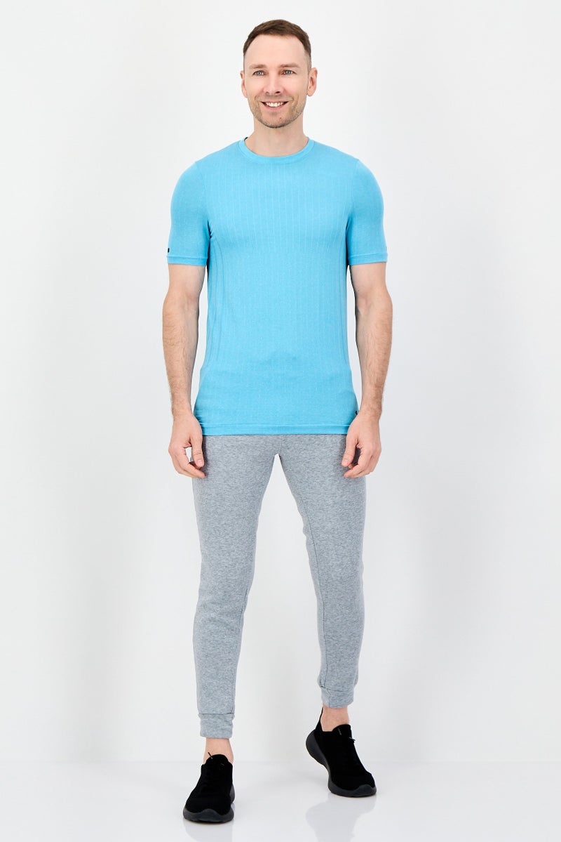 UNDER ARMOUR تي شيرت رياضي للرجال بأكمام قصيرة مناسب في الهواء الطلق، أزرق سماوي - Image 3